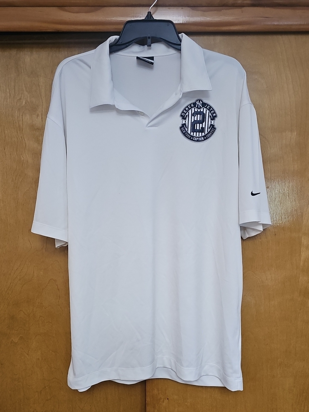 Nike White Men’s Polo with Navy Embroidered Logo- Jeter Patch